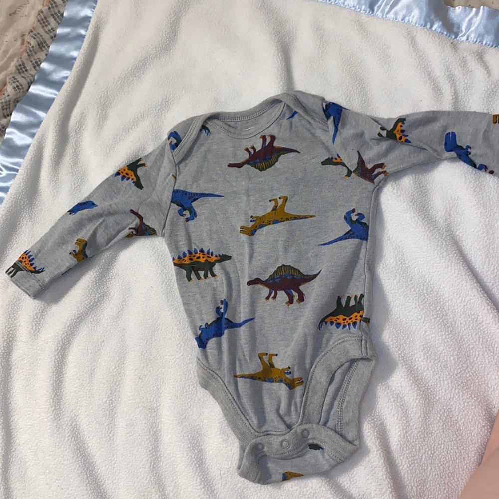 Long sleeved buttoned onesie.